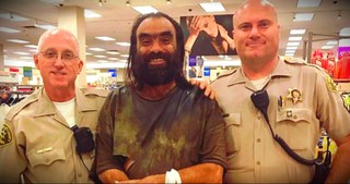 Woman Spots Police Officers Walking A Homeless Man Through A Store