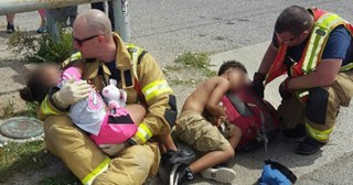 Compassionate Firefighters Comfort Scared Children After a Car Crash