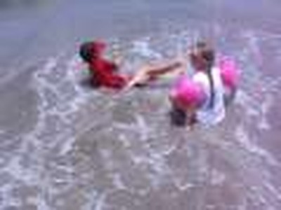 Bryce and Kaitlyn enjoying the waves