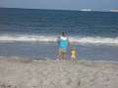 family walking on beach