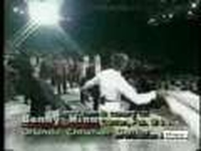 Benny Hinn hits people with his jacket