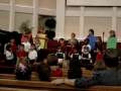 Kaitlyn and Bryce's class singing in their school chapel.