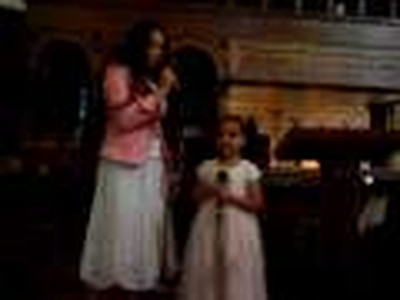 Laylah and Jessica singing.