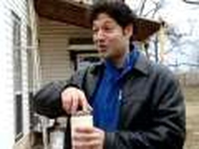 Jordan at Akin Acres drinking the produce--fresh dairy from