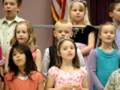 Austin sings at school