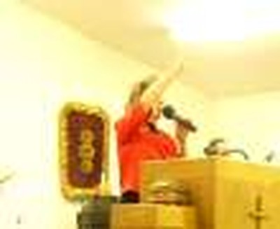 pastor singing praises
