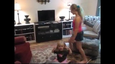 Sami teaches little girl how to do handstand