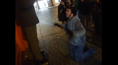 Heckler Mockingly Prostrates Before Preacher