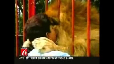 Lion Hugs Rescuer!