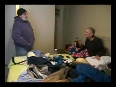 Tony Tona Visiting With a Homeless man
