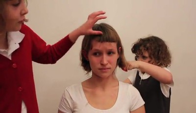 Courageous Big Sister Lets Her Little Sisters Give Her a Makeover...That Includes a Hair Cut