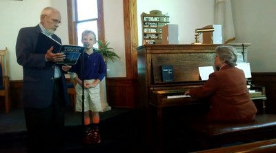 Brian singing with his Papa while Grandmama plays piano