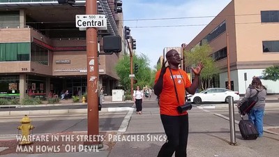 Warfare In The Streets Preacher Sings, Man Howls  Oh Devil