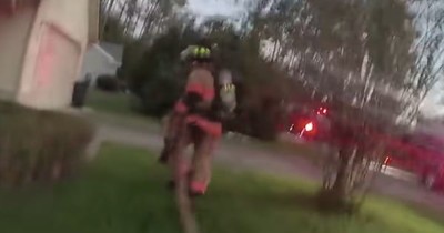 Deputy Runs into Burning House to Help Put out Fire and Then Sees a Blanket That's Wriggling