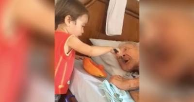 Video of Little Boy Feeding His Bed-Ridden Grandpa Goes Viral