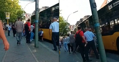 The Incredible Moment 40 Strangers Banded Together To Rescue Man Trapped Under Bus