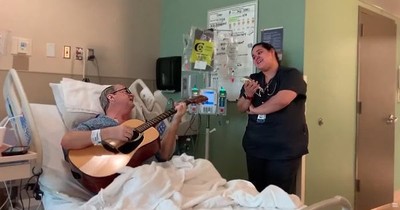 Chemo Patient And Nurse Sing 'O Holy Night' In Hospital Room