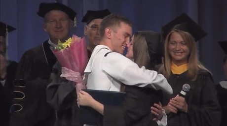 Navy Sailor Surprises His Wife in the Middle of Her Graduation Ceremony!