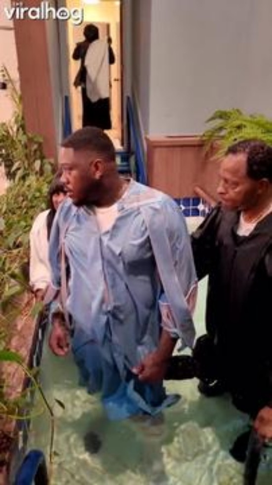 Pastor Falls Into Water During Baptism