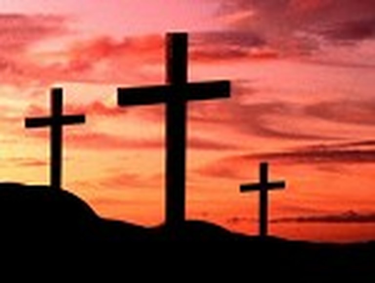 Three Crosses in Front of a Red Sky