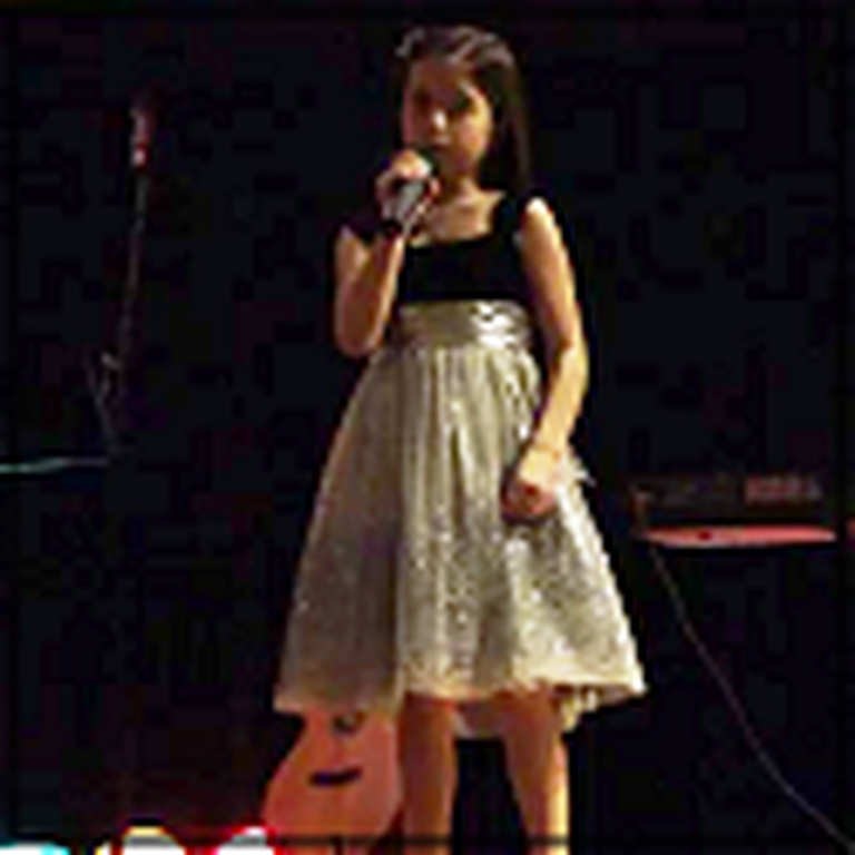 7 Year Old Girl Beautifully Sings O Holy Night at Church