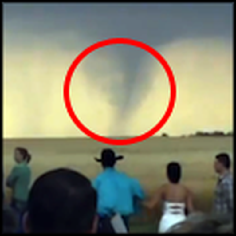 Couple Gets Married with a Tornado Approaching Them