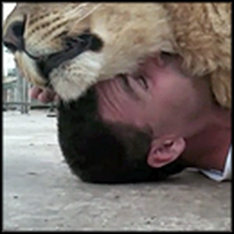 Man Adorably Cuddles with a Lovable Lion