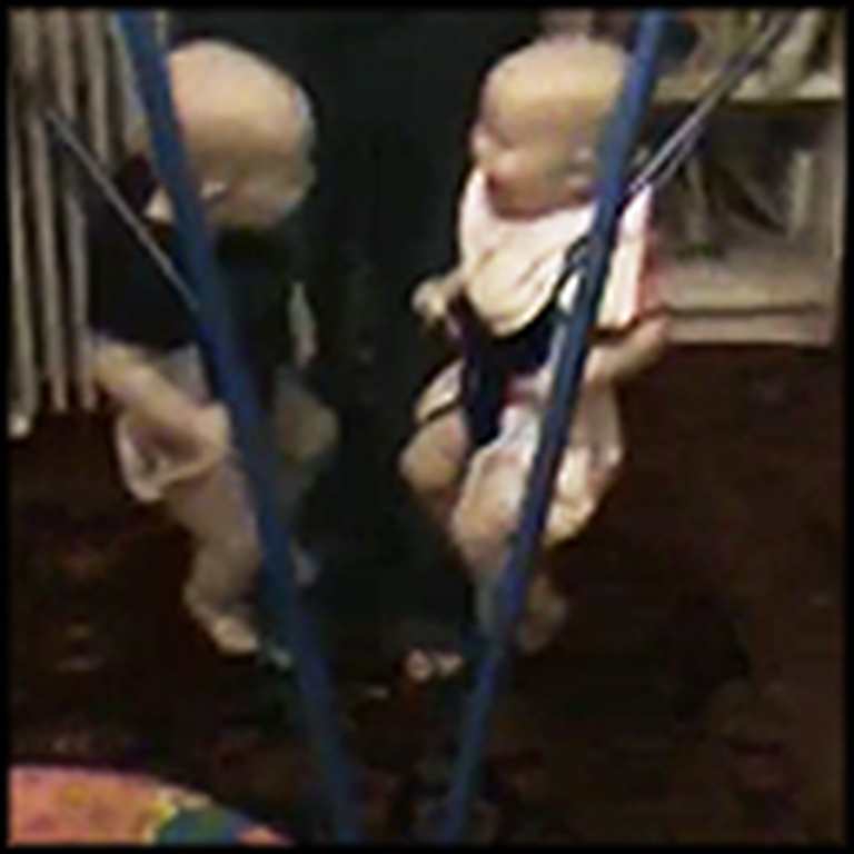Adorable Twins Giggling Uncontrollably in Jolly Jumpers