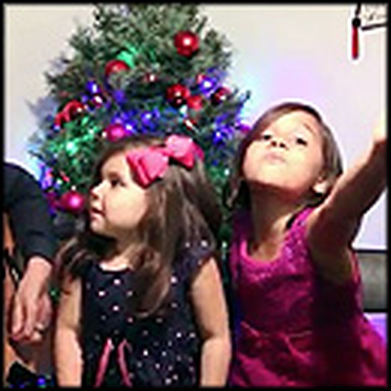 Father Sings Jingle Bells With His Two Adorable Daughters
