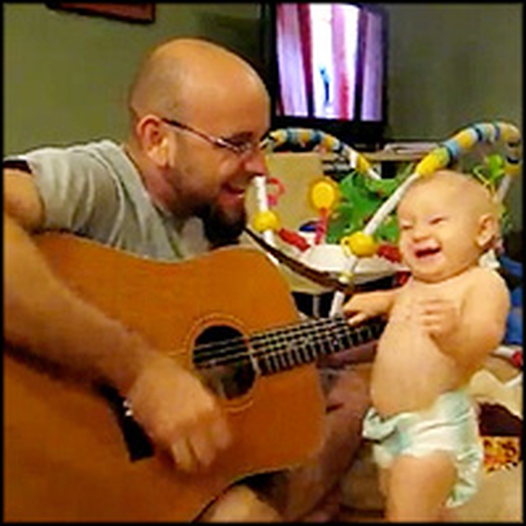 Adorable Baby Loves Rock 'n Roll Music