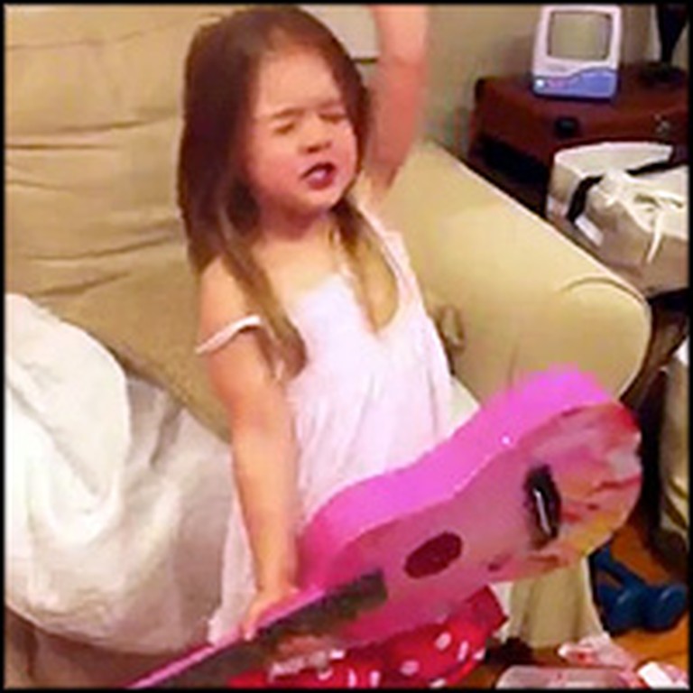 Cute 4 Year Old Rocks Out After Getting a Birthday Present