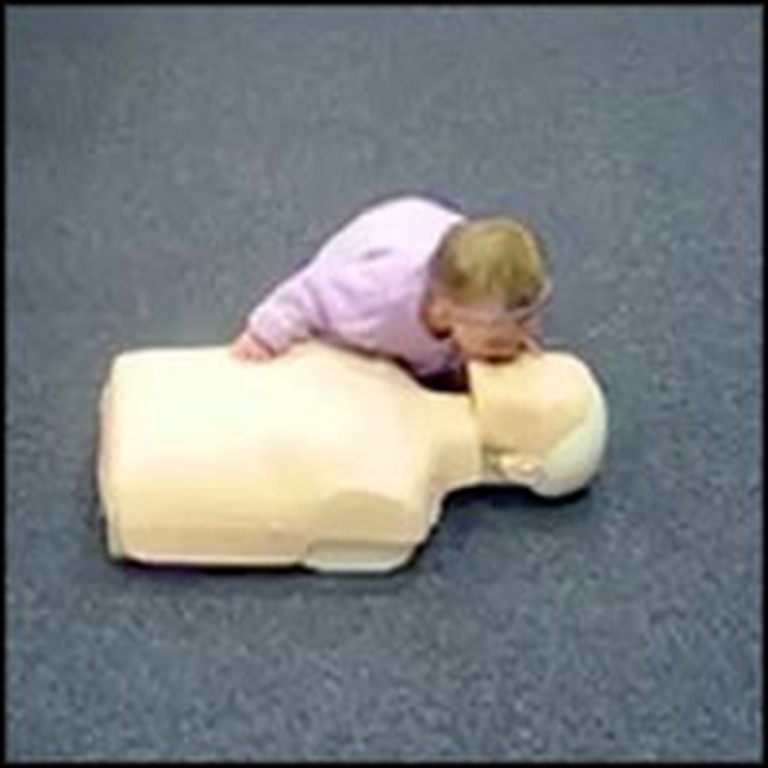 Genius Baby Gives CPR Perfectly to a Dummy
