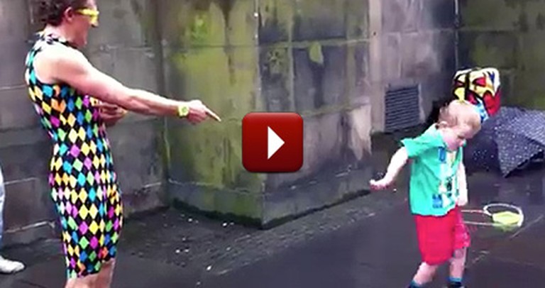 Hilarious Little Boy Steals the Spotlight From a Street Performer