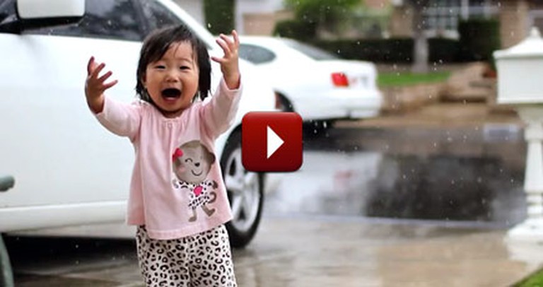 Sweet Baby Experiences Rain for the Very First Time - and Supreme JOY