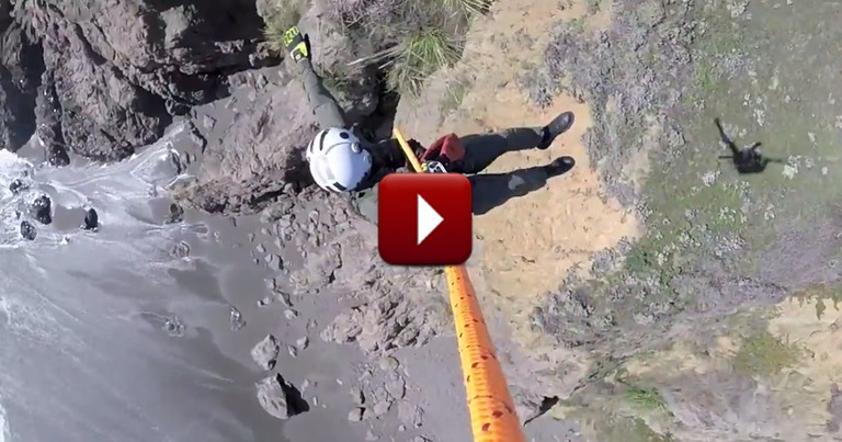 You'll Hold Your Breath During this Daring Rescue of a Dog Trapped on a Cliff