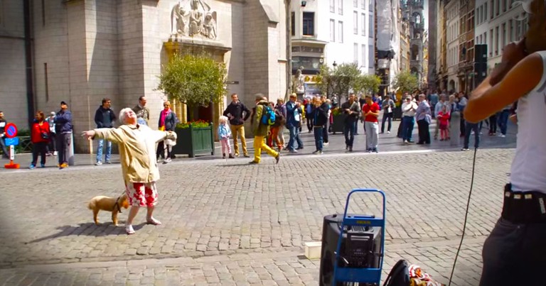 Apparently, This Granny Really Liked This Street Performer. . .And She's Got MOVES!