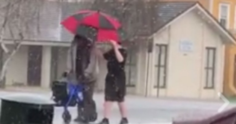 Teen Rushes To The Aid Of An Elderly Man Caught In A Sudden Hailstorm