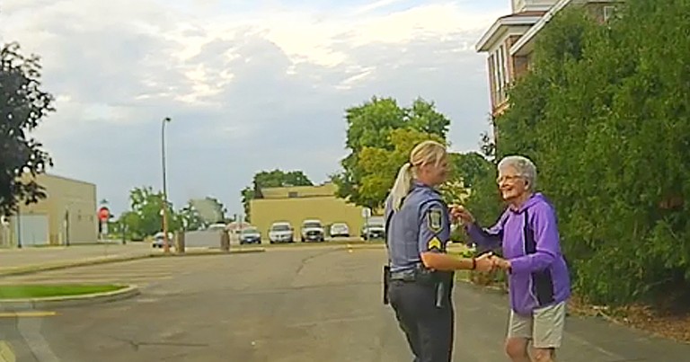 92-Year-Old Caught On Camera Sweetly Dancing With Police Officer 