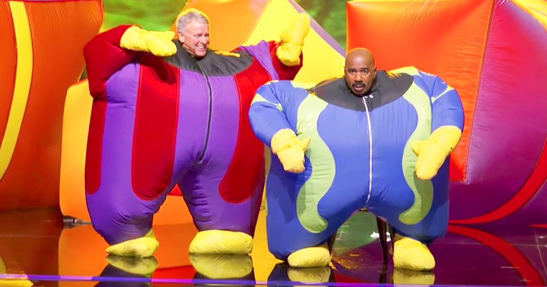 Inflatable Man And Steve Harvey Wow Crowd With Funny Moves