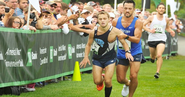 Competitor Helps Struggling Runner Cross Finish Line