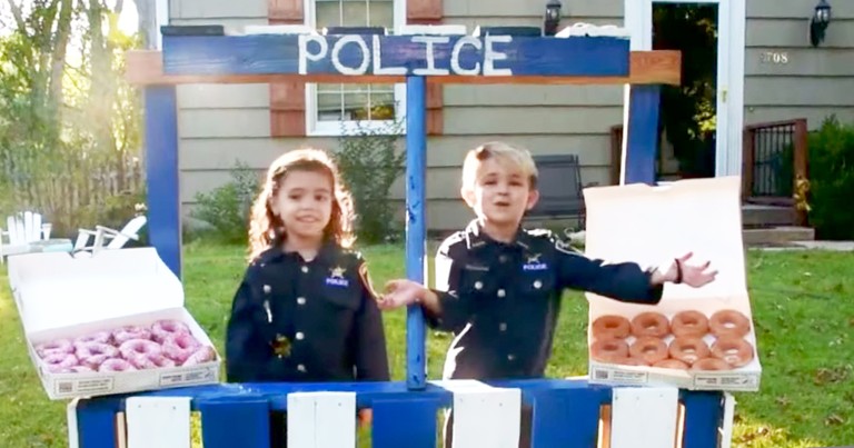 Kind 6-Year-Old Boy Gives Out Donuts To Local Police Officers