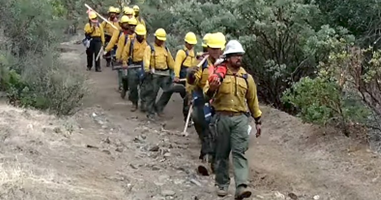 Firefighters Sing Breathtaking Hymn While Marching Down Mountain