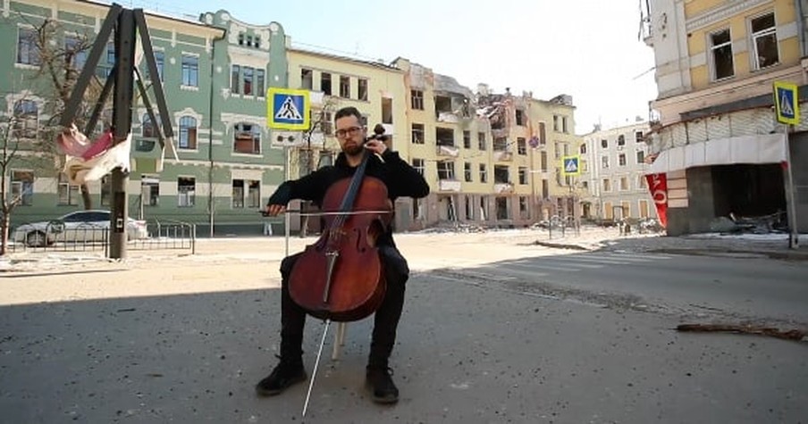 Hauntingly Beautiful Tune Fills The Damaged Streets As Cellist Plays In Ukraine