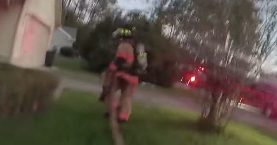 Deputy Runs into Burning House to Help Put out Fire and Then Sees a Blanket That's Wriggling