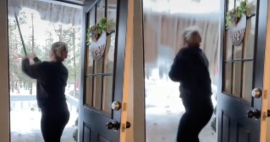 Woman Clearing Snow And Ice Comes Frightfully Close To Getting Covered