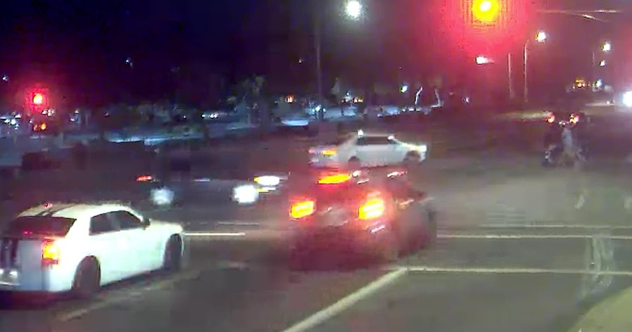 Couple Narrowly Escape Drunk Driver While Pushing Stroller Through Intersection