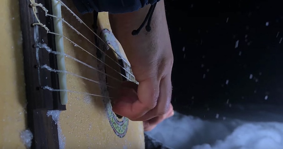 Guitar Performance Of 'The Sound Of Silence' In The Middle Of A Blizzard