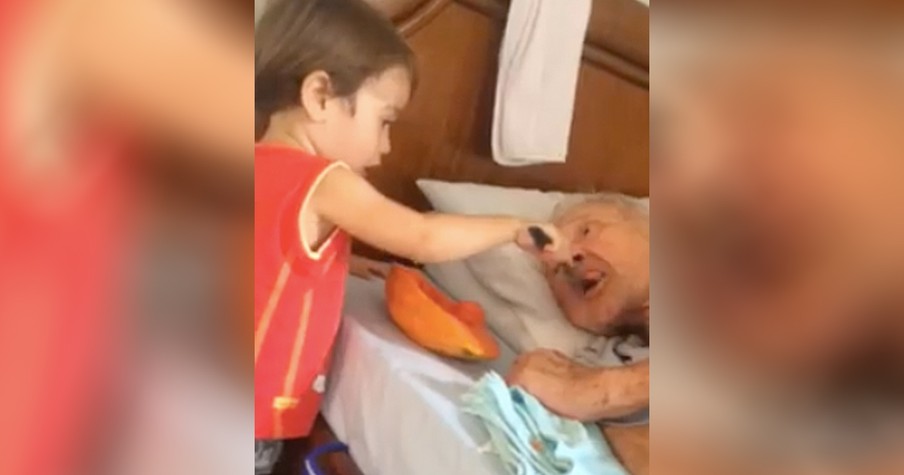 Video of Little Boy Feeding His Bed-Ridden Grandpa Goes Viral