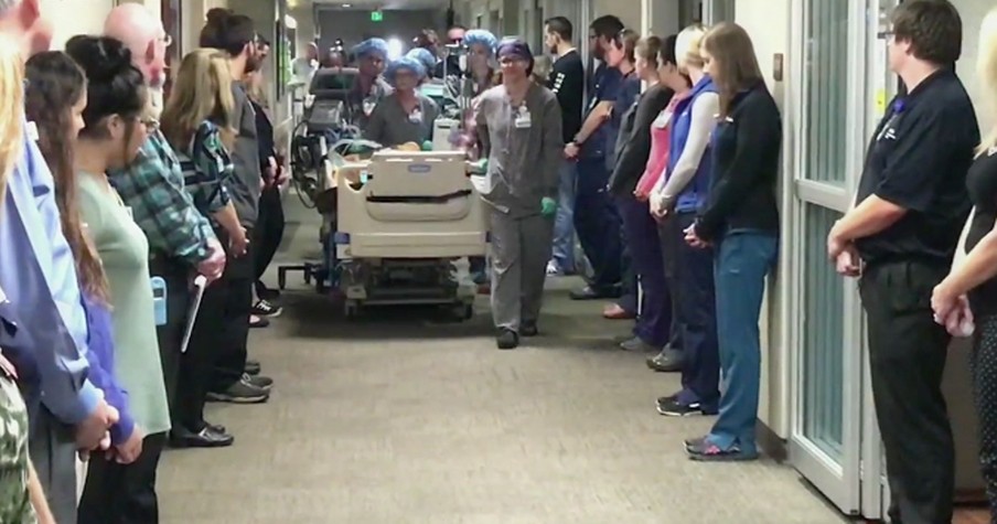 Hospital Staff Lines Up For ‘Walk of Respect’ Honoring Man's Sacrifice