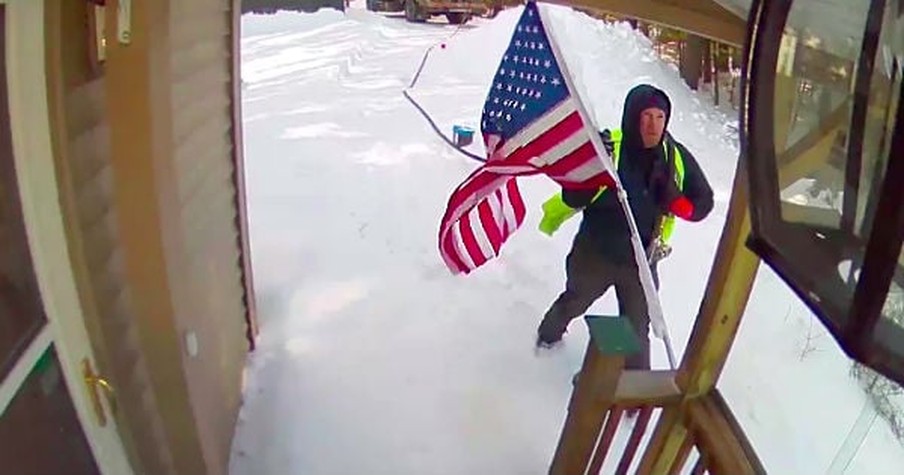 Veteran's Security Cameras Are Rolling As Deliveryman Spots An American Flag In The Snow